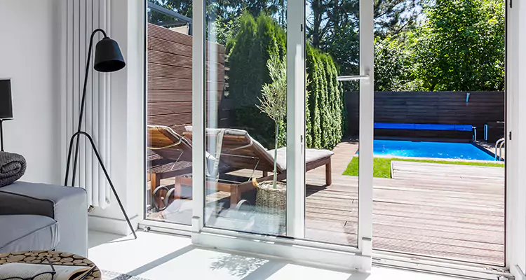 Fixing A Sliding Screen Door Roller in Three Lakes, FL